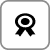 A simple black award ribbon icon with two tails.